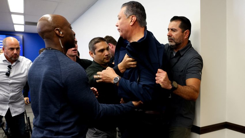 US Senator Alex Padilla, who interrupted the press conference held by U.S. Secretary of Homeland Security Kristi Noem, is removed from the venue, in Los Angeles, California, U.S., June 12, 2025.