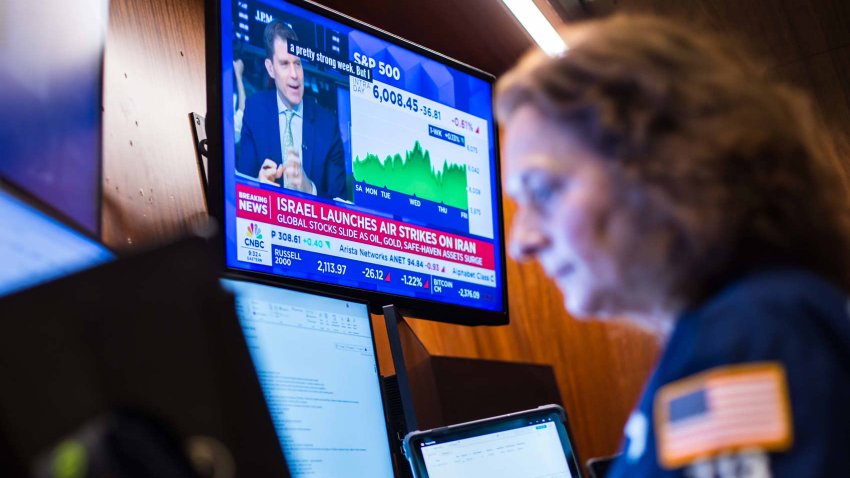 Traders work at the New York Stock Exchange on June 13, 2025.