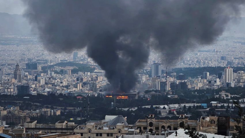 Smoke rises after a reported Israeli strike on a building used by Islamic Republic of Iran News Network, part of Iran’s state TV broadcaster, on June 16, 2025 in Tehran, Iran.