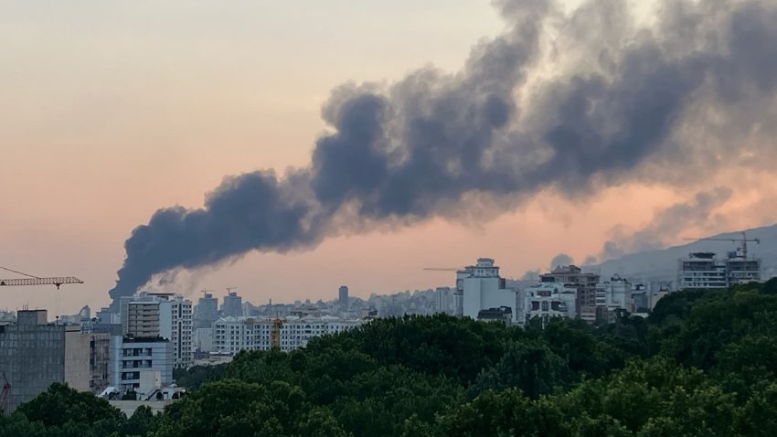 Smoke billows from an explosion at the Islamic Republic of Iran Broadcasting (IRIB) building in Tehran on June 16, 2025.