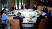 KANANASKIS, ALBERTA – JUNE 16: (L-R) Italian Prime Minister Giorgia Meloni, French President Emmanuel Macron, Canadian Prime Minister Mark Carney, U.S. President Donald Trump, British Prime Minister Kier Starmer, German Chancellor Friedrich Merz, European Union Commission President Ursula von der Leyen, European Union Council President Antonio Costa and Japanese Prime Minister Shigeru Ishiba participate in a meeting at the G7 Leaders’ Summit on June 16, 2025 in Kananaskis, Alberta.