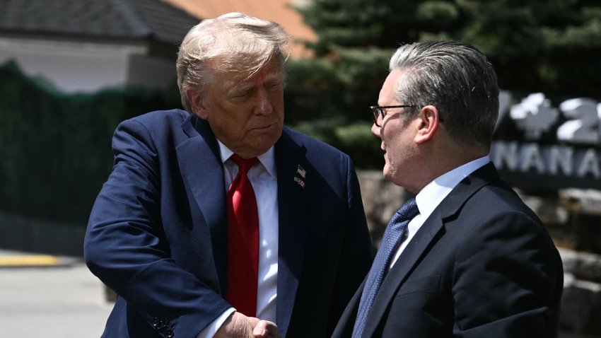 US President Donald Trump (L) shakes hands with British Prime Minister Keir Starmer as they speak to reporters after meeting during the Group of Seven (G7) Summit at the Pomeroy Kananaskis Mountain Lodge in Kananaskis, Alberta, Canada on June 16, 2025.