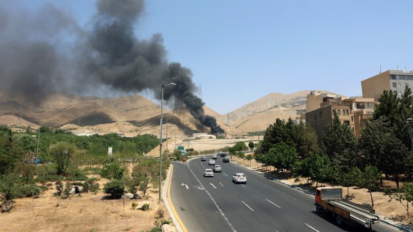 Smoke billows for the second day from the Shahran oil depot, northwest of Tehran, on June 16, 2025.