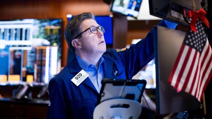 Traders work at the New York Stock Exchange on June 18, 2025.