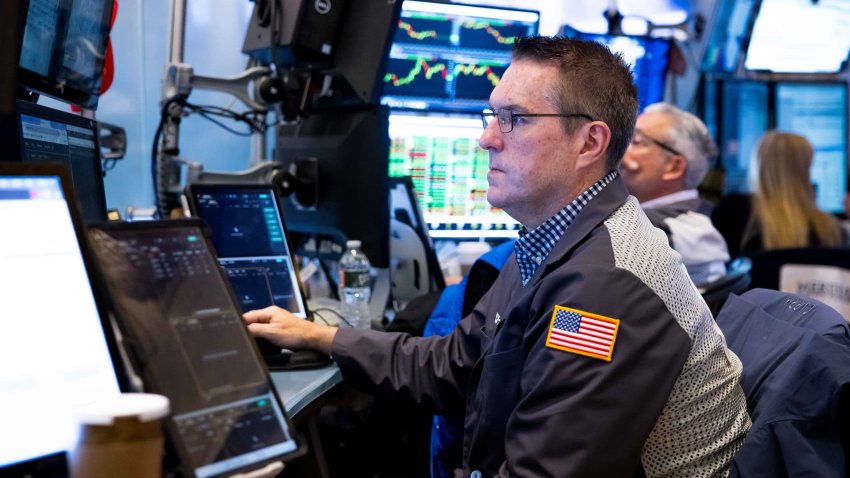 Traders work at the New York Stock Exchange on June 18, 2025.