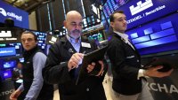 Traders work on the floor of the New York Stock Exchange (NYSE) in New York City on June 18, 2025.