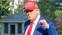 US President Donald Trump gestures towards the new flagpole on the South Lawn of the White House after arriving on Marine One in Washington, DC, US, on Saturday, June 21, 2025.