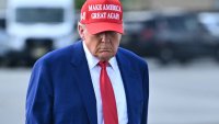 US President Donald Trump makes his way to board Air Force One at Morristown Municipal Airport in Morristown, New Jersey, on June 21, 2025 as he returns to the White House from his golf club in Bedminster, New Jersey.