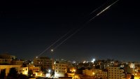 Missiles fired from Iran in retaliation for Israeli attacks are seen in the sky over the Hebron, West Bank on June 21, 2025.