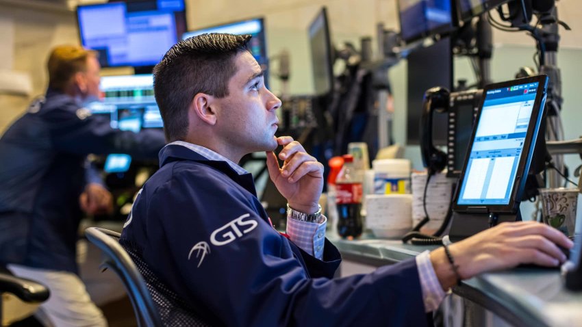Traders work at the New York Stock Exchange on June 23, 2025.
