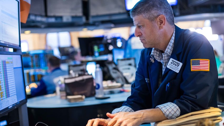 Traders work at the New York Stock Exchange on June 23, 2025.