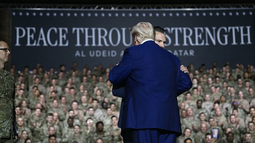 US President Donald Trump (L) greets Secretary of Defense Pete Hegseth as he arrives to address troops at the Al-Udeid air base southwest of Doha on May 15, 2025.