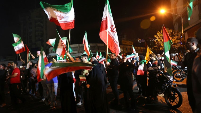 A group of Iranians celebrate following Iran’s attack on U.S. military base in Qatar, amid the Iran-Israel conflict, in Tehran, Iran, June 23, 2025.