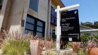 A Compass Realty sign is posted in front of a home for sale on June 23, 2025 in Greenbrae, California.