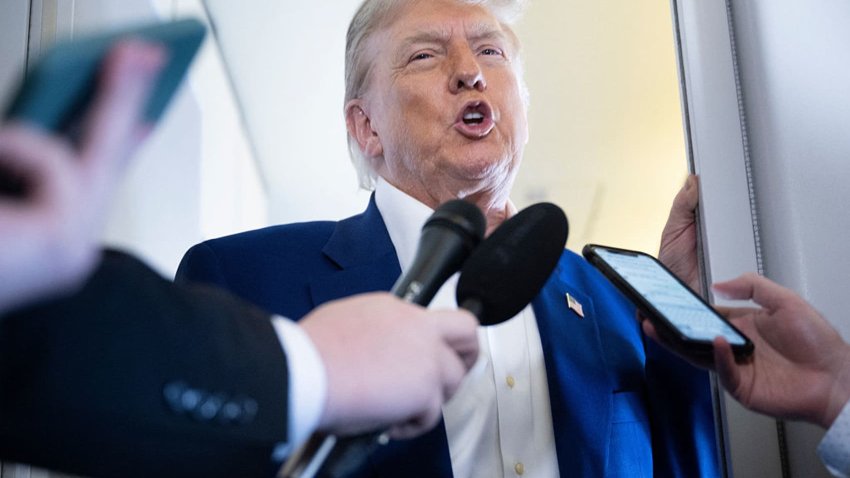 US President Donald Trump speaks to reporters about the Israel-Iran conflict, aboard Air Force One on June 24, 2025, while traveling to attend the NATO’s Heads of State and Government summit in The Hague in the Netherlands.