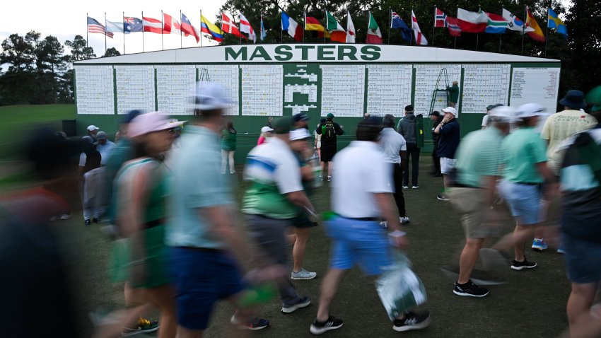 Patrons begin leaving the course after the first round of Masters Tournament
