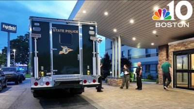 Investigators say Manchester officer who shot hotel guest was returning fire