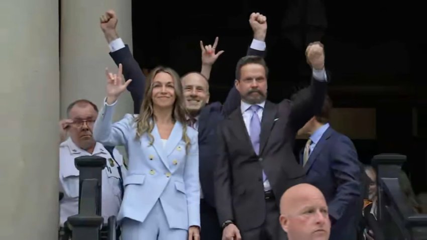 Karen Read and her legal team celebrate as she leaves Norfolk Superior Court to cheers from a crowd of supporters on Wednesday, June 18, 2025, in Dedham, Massachusetts.