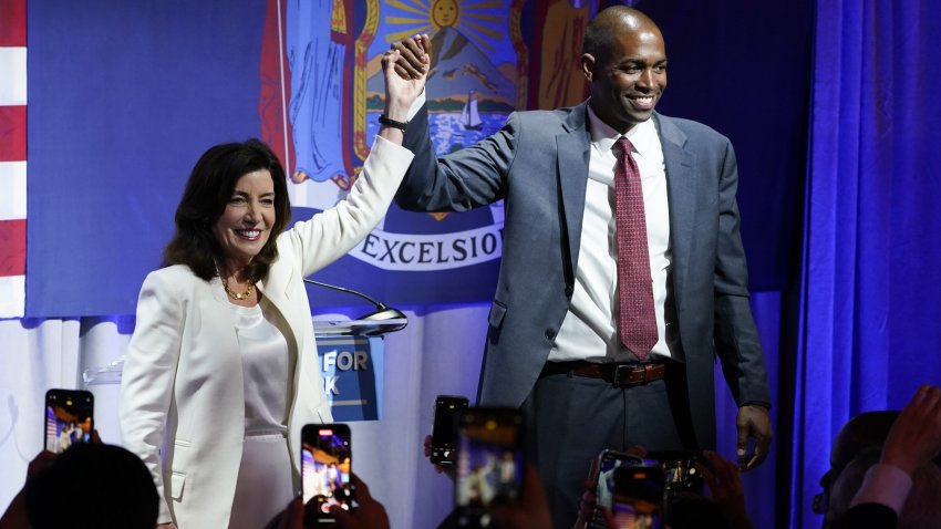 New York Gov. Kathy Hochul stands with Lieutenant governor Antonio Delgado during the primary election night party, Tuesday, June 28, 2022, in New York.