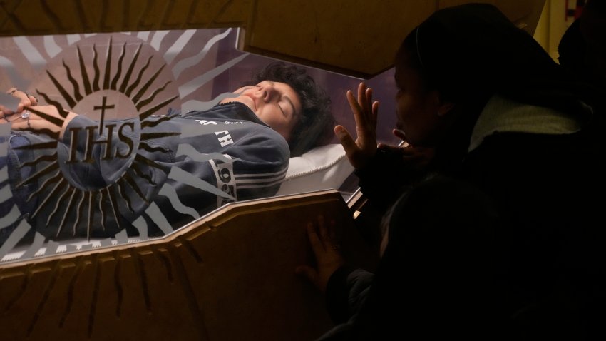 The body of Carlo Acutis, an Italian boy who died in 2006 of leukemia, lies in his tomb in Assisi, Italy, on Saturday, March 1, 2025.