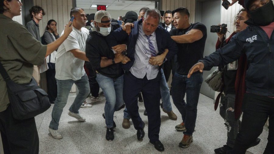  New York City Comptroller Brad Lander is placed under arrest by Immigration and Customs Enforcement (ICE) and FBI agents outside federal immigration court on Tuesday, June 17, 2025, in New York.