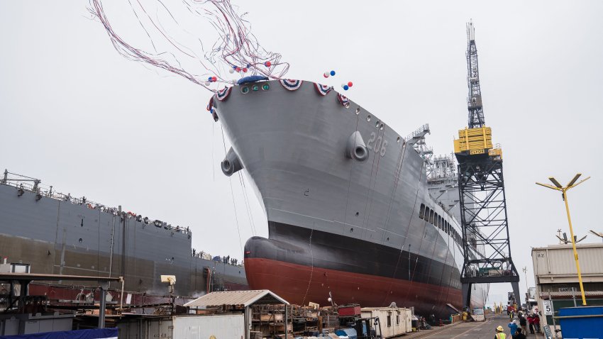 USNS Harvey Milk departs the General Dynamics NASSCO shipyard after a ceremonial address in San Diego, Calif., on Nov. 6, 2021.