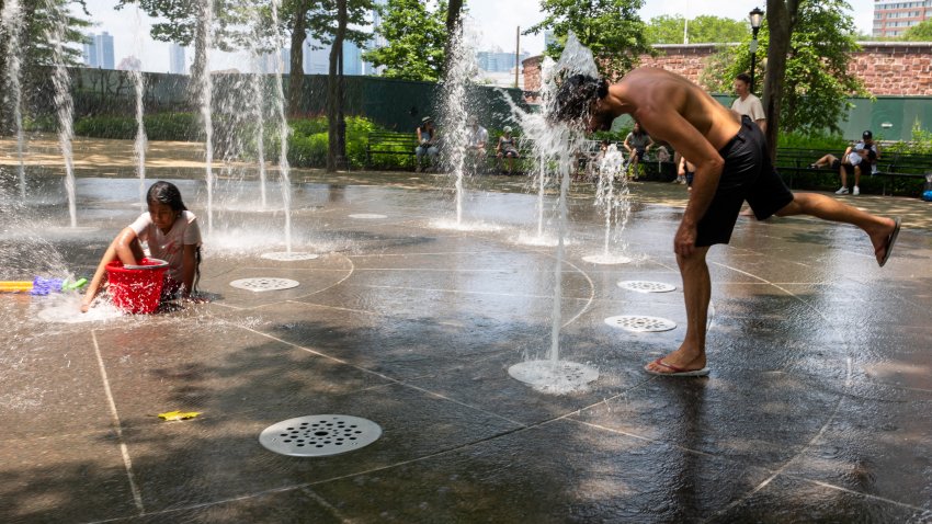 NEW YORK CITY – JUNE 23: People try to stay cool in Manhattan on June 23, 2025, in New York City. Temperatures in New York reached the high 90s with a heat index of over 100 degrees as the first heat wave of the year moves through parts of the Midwest and East Coast. (Photo by Spencer Platt/Getty Images)