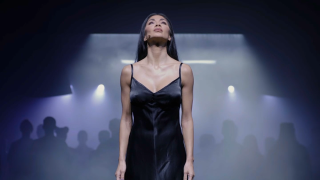 Nicole Scherzinger performing on stage.