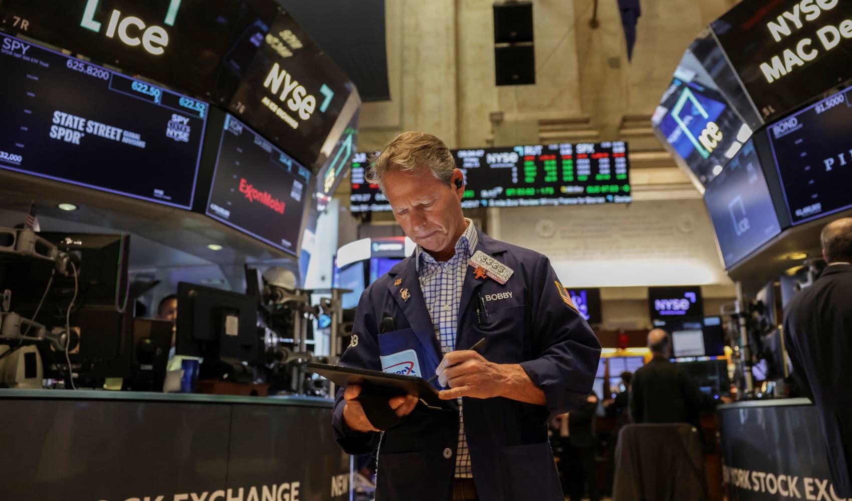 Stock futures are little changed after S&P 500 ekes out another closing record: Live updates