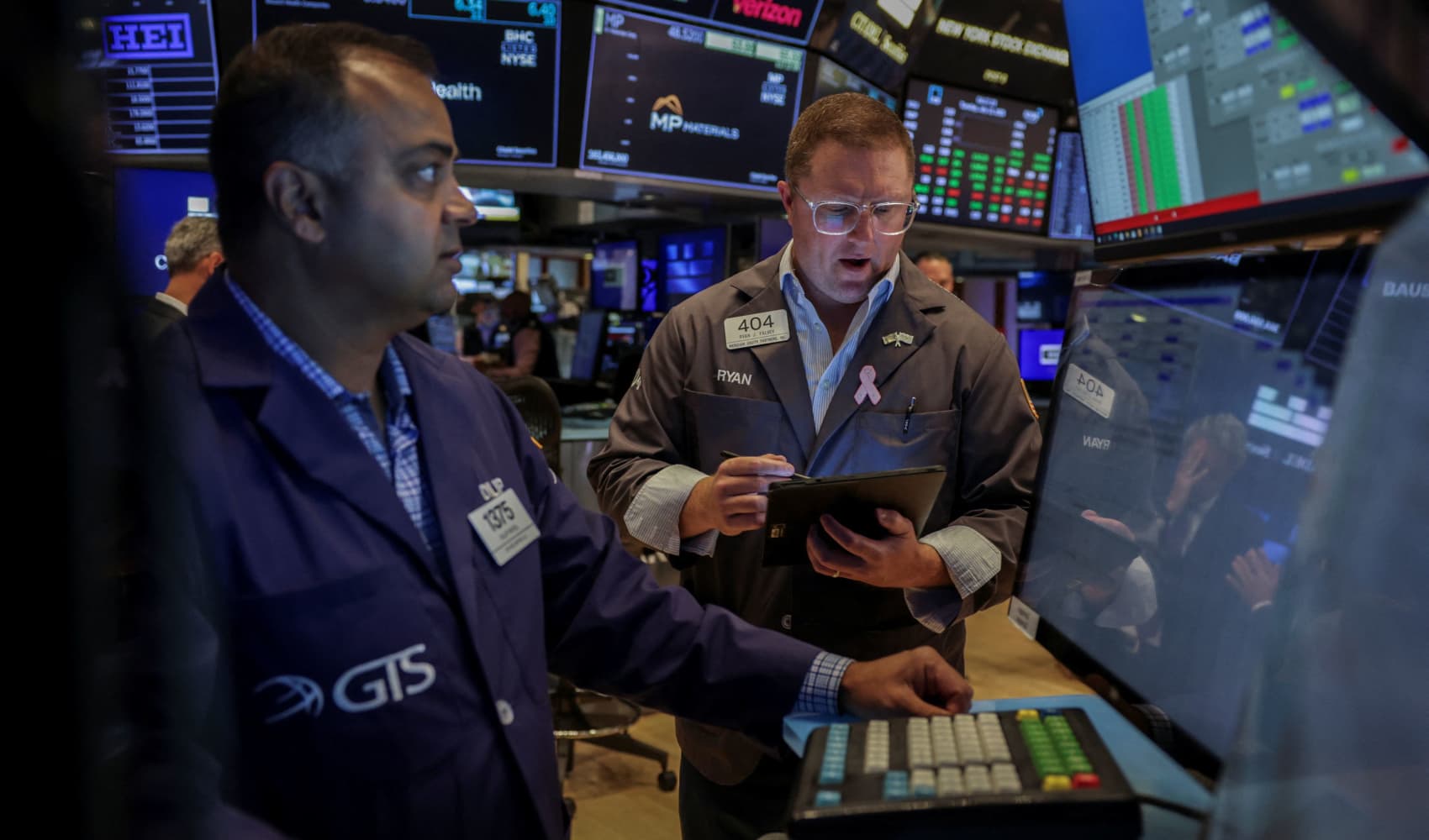 Stock futures are little changed as traders await big tech earnings, eye trade developments: Live updates