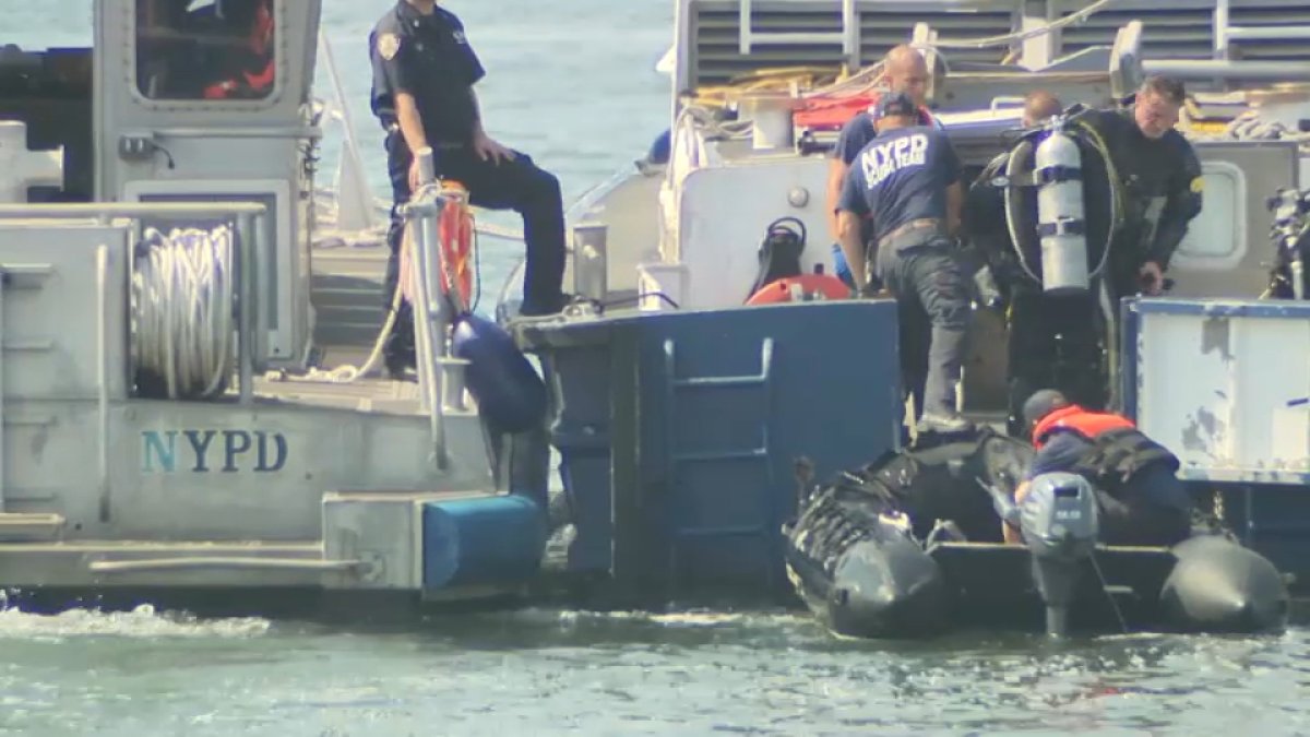 Divers search Rockaway waters for missing swimmer