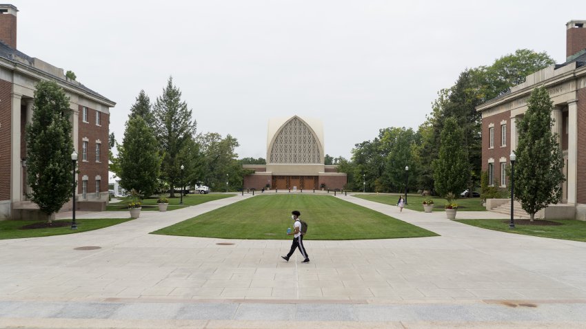 A student on campus at the University of Rochester