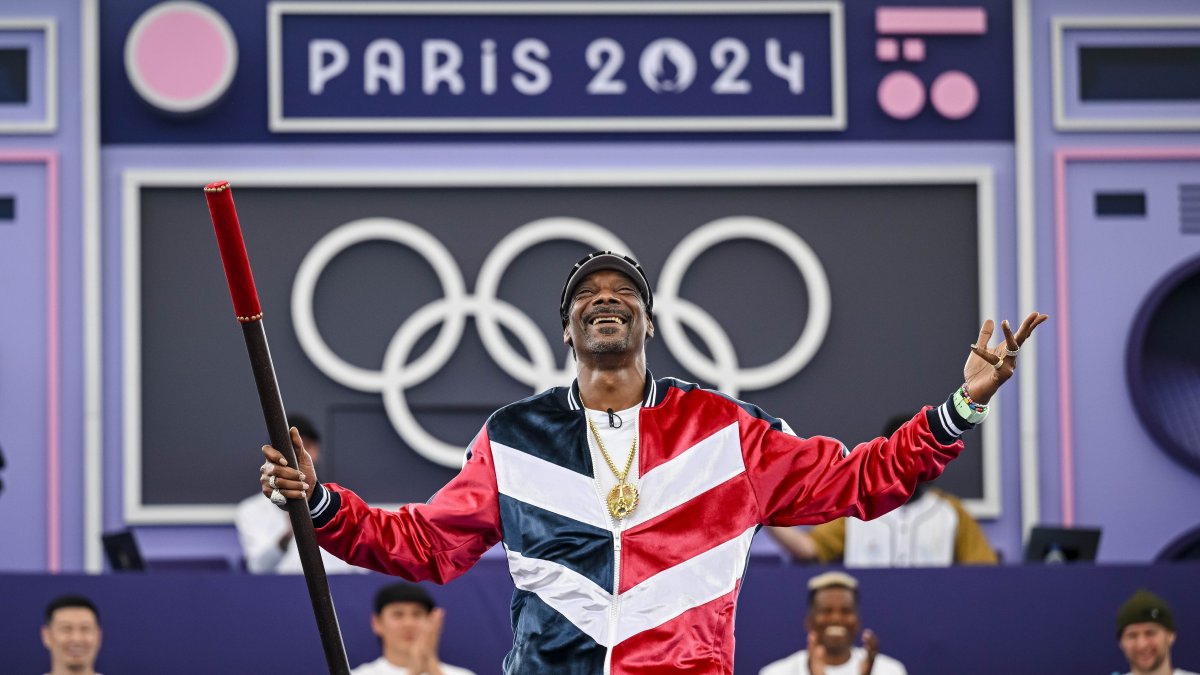 WHAT IS SNOOP DOGG S ROLE AT THE 2026 OLYMPICS visual data 2