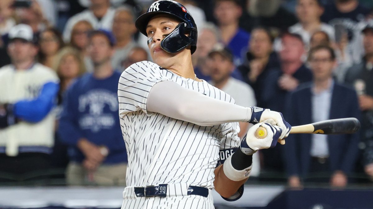 Judge rallies Yankees past Blue Jays 9-6 to save season and avert ALDS sweep