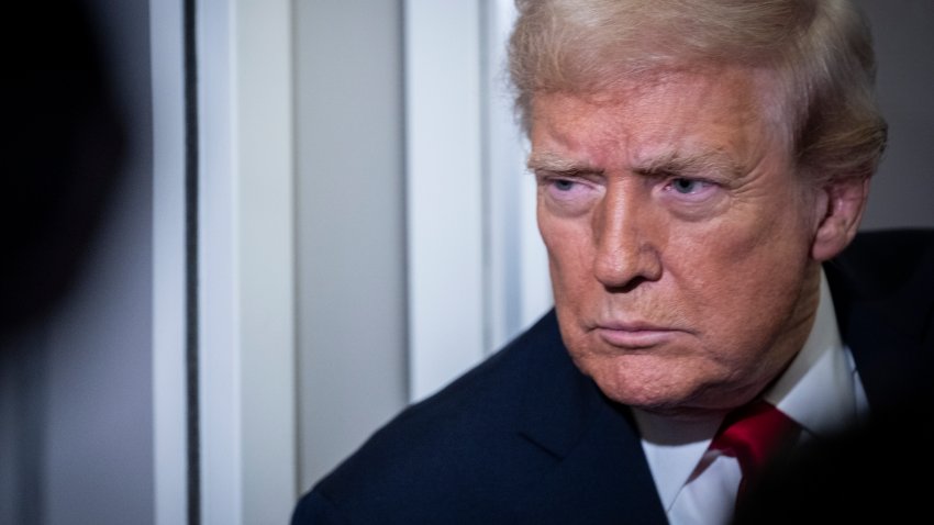 President Donald Trump speaks to the media aboard Air Force One on November 25, 2025 in flight en route to Florida. The Trumps are traveling to Mar-a-Lago in Palm Beach, Florida for the Thanksgiving holiday.
