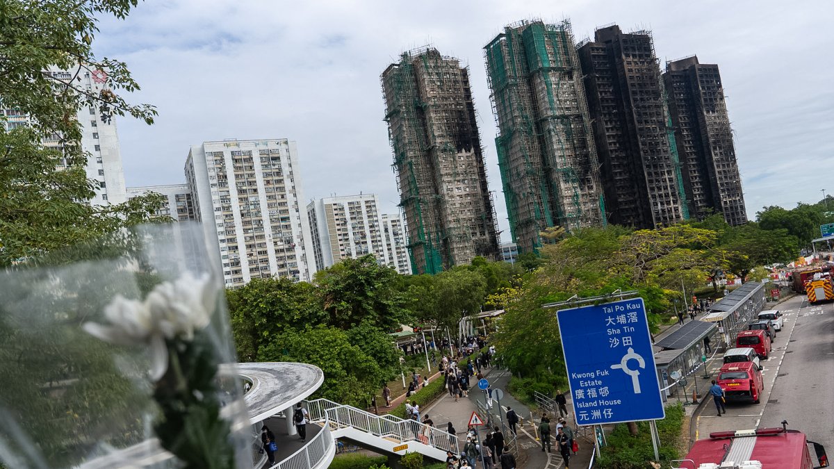 Hong Kong authorities say netting on buildings that caught fire, killing 151, did not meet code
