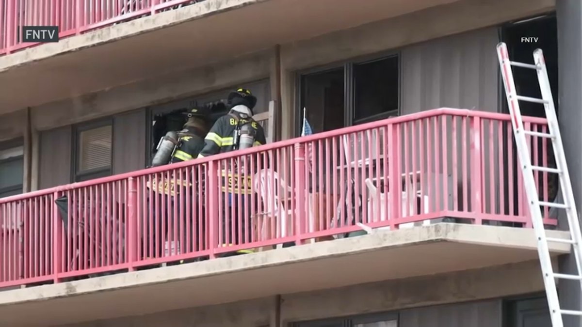 Woman killed, police officers hurt in fire at NJ senior complex