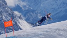 United States' Lindsey Vonn crashes during an alpine ski women's downhill race, at the 2026 Winter Olympics, in Cortina d'Ampezzo, Italy, Sunday, Feb. 8, 2026. (AP Photo/Jacquelyn Martin)