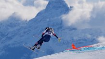 United States' Lindsey Vonn crashes during an alpine ski women's downhill race, at the 2026 Winter Olympics, in Cortina d'Ampezzo, Italy, Sunday, Feb. 8, 2026. (AP Photo/Jacquelyn Martin)