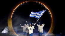 Flagbearer Nefeli Tita of Team Greece enters the stadium