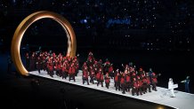 Athletes of Team Canada enter the stadium