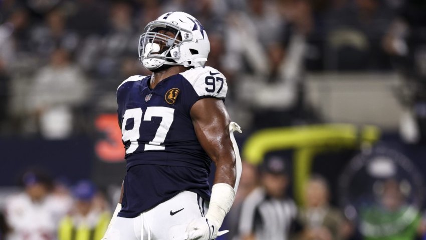 ARLINGTON, TEXAS – NOVEMBER 28: Osa Odighizuwa #97 of the Dallas Cowboys celebrates after a sack during the second half of an NFL football game against the New York Giants at AT&T Stadium on November 28, 2024 in Arlington, Texas. (Photo by Kevin Sabitus/Getty Images)