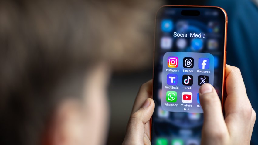 Photo illustration of a teenager with social media apps.