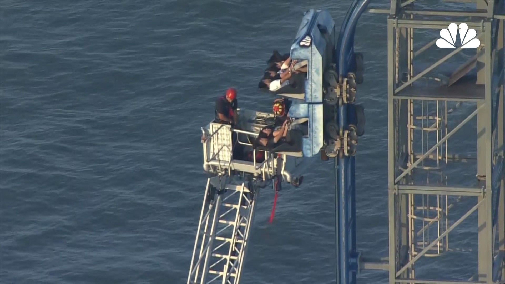 Students rescued from Texas roller coaster that stalled during vertical climb