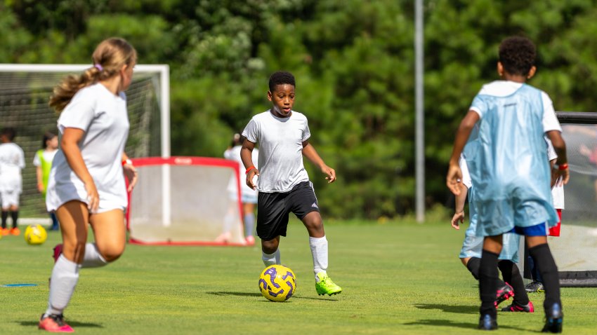 Camp participants participate in a scrimmage match on July 24, 2025 in Fayetteville, Georgia.