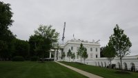 WASHINGTON, DC – APRIL 28: Workers are seen on top of a construction crane above the White House on April 28, 2026 in Washington, DC. U.S. President Donald Trump’s administration continues to try to find a way to facilitate the building of his planned ballroom progress. (Photo by Anna Moneymaker/Getty Images)