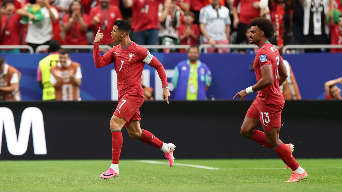 Cristiano Ronaldo scores first goal of tournament to make World Cup history