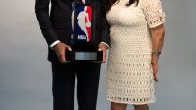 Minneapolis, MN May 16: After a weeks-long battle with COVID-19, Jacqueline Cruz, the mother of Timberwolves center Karl-Anthony Towns, died Monday as a result of the virus, the Wolves said. She was 59. Here, Cruz posed with her son as he had his official pictures taken by team photographer David Sherman after being named NBA Rookie of the Year in 2016. (Photo by Brian Peterson/Star Tribune via Getty Images)