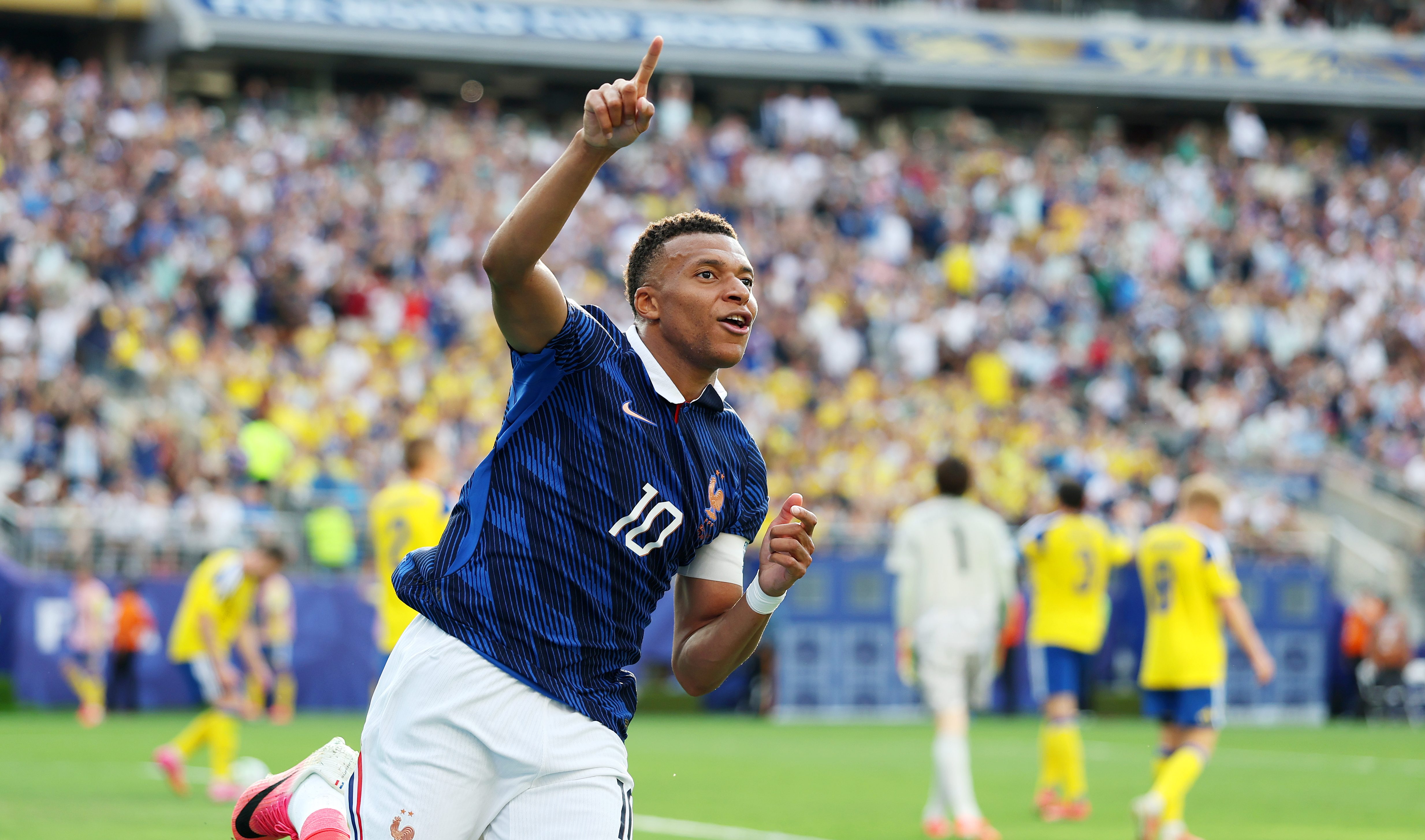 Kylian Mbappe celebrating his historic goal for France