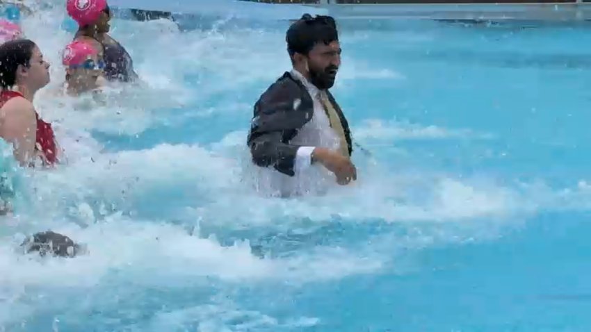 Mayor Zohran Mamdani (D-New York City) soaks in the start of pool season after jumping in while wearing a full suit.